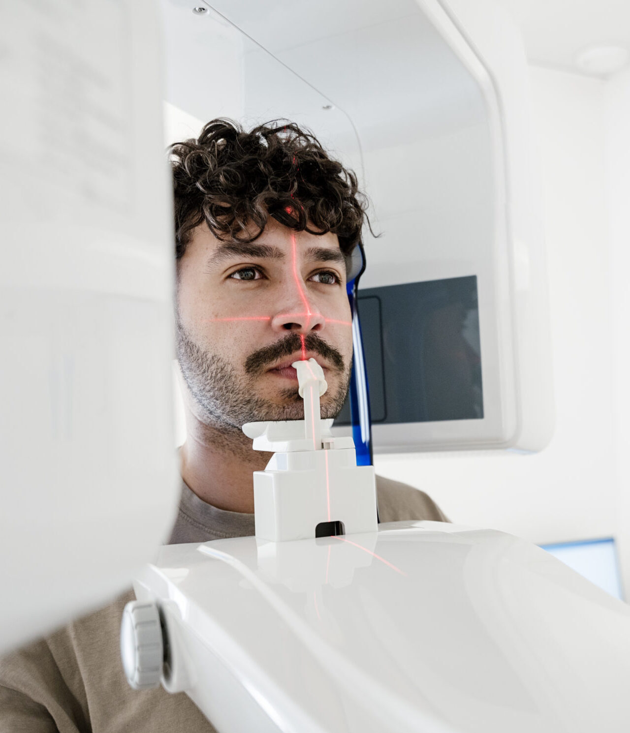 patient undergoing dental x ray examination in modern clinic